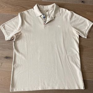 Cream classic Burberry polo short sleeve.